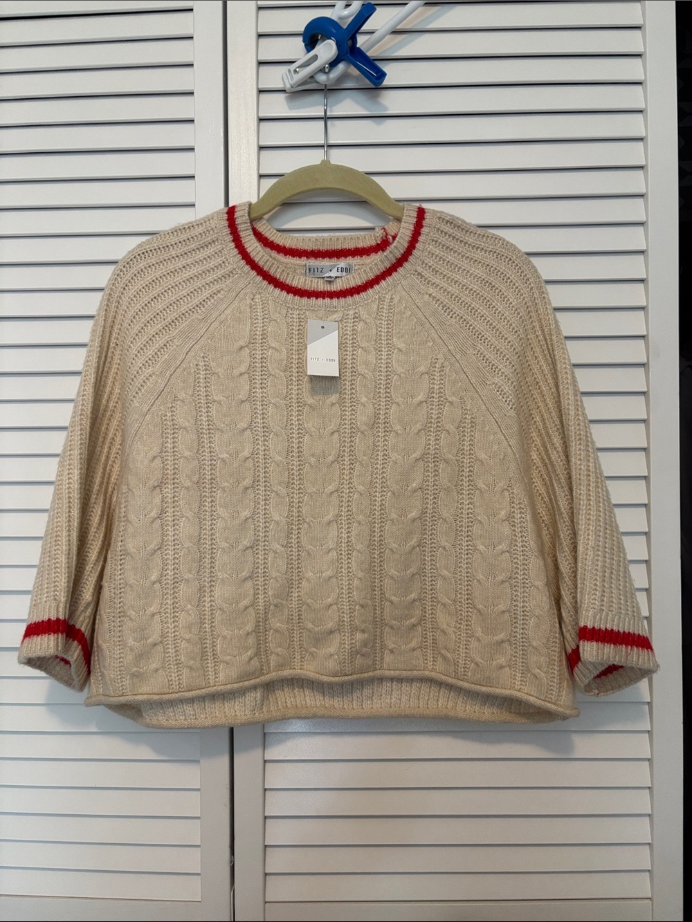 Cream Cable-Knit Crewneck Sweater with Red Trim